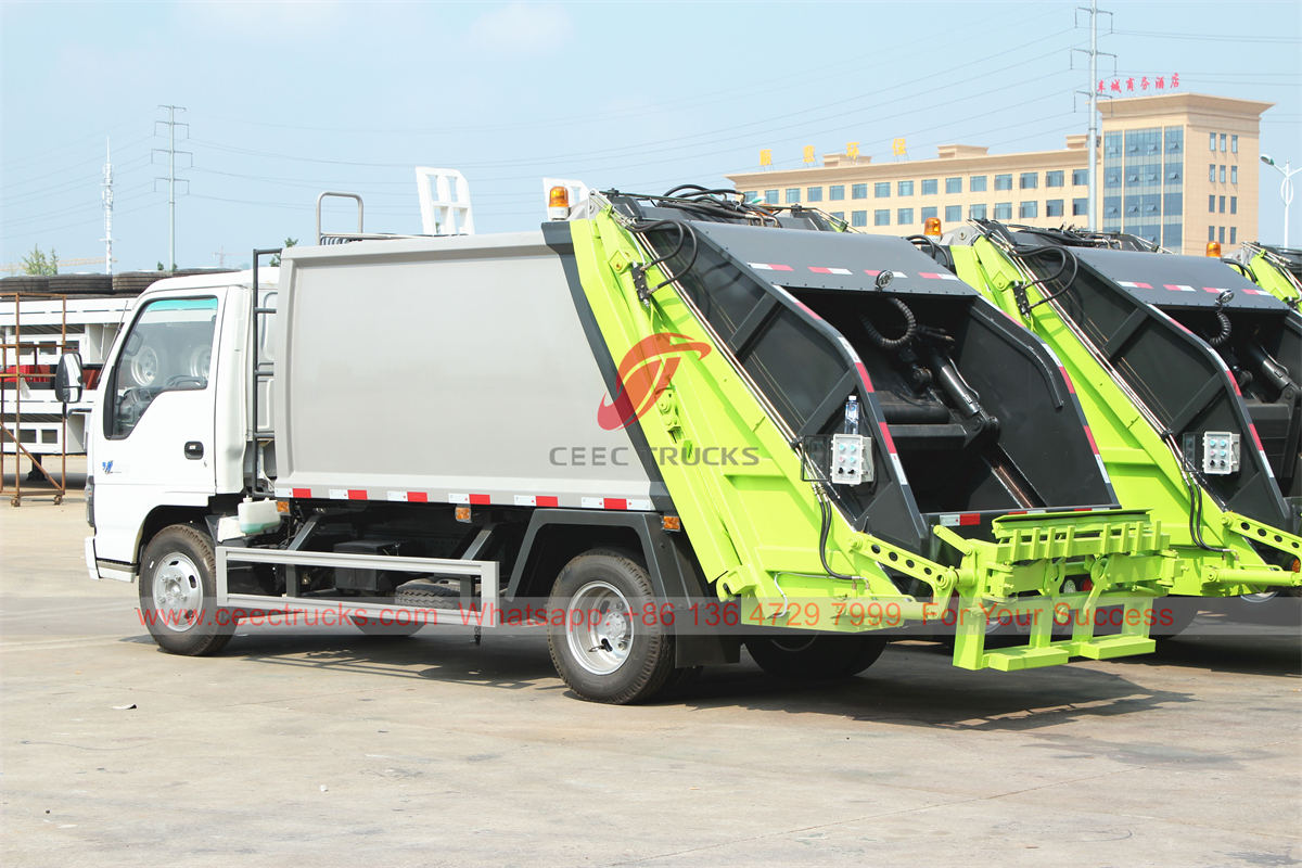 Camion à ordures à compactage hydraulique ISUZU