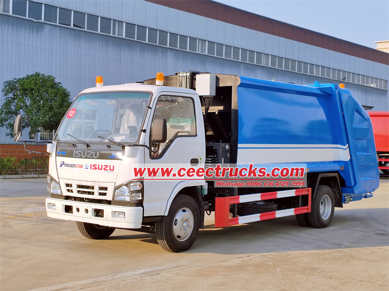 Isuzu NKR trash compactor truck