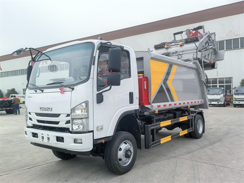 ISUZU NPR off-road garbage rear loader truck ISUZU NPR off-road garbage rear loader truck