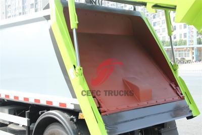 Trash compactor made by Isuzu trucks