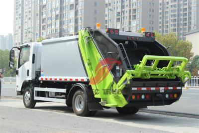 Trash compactor made by Isuzu trucks