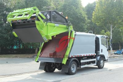 Trash compactor made by Isuzu trucks